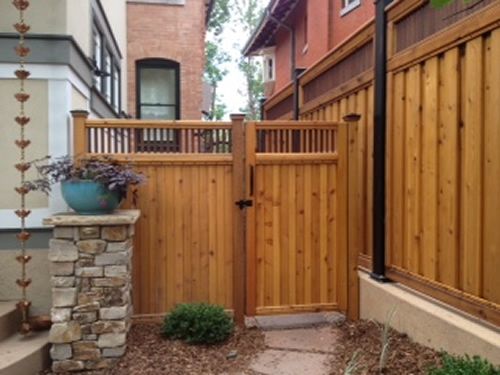 wood fences with iron work